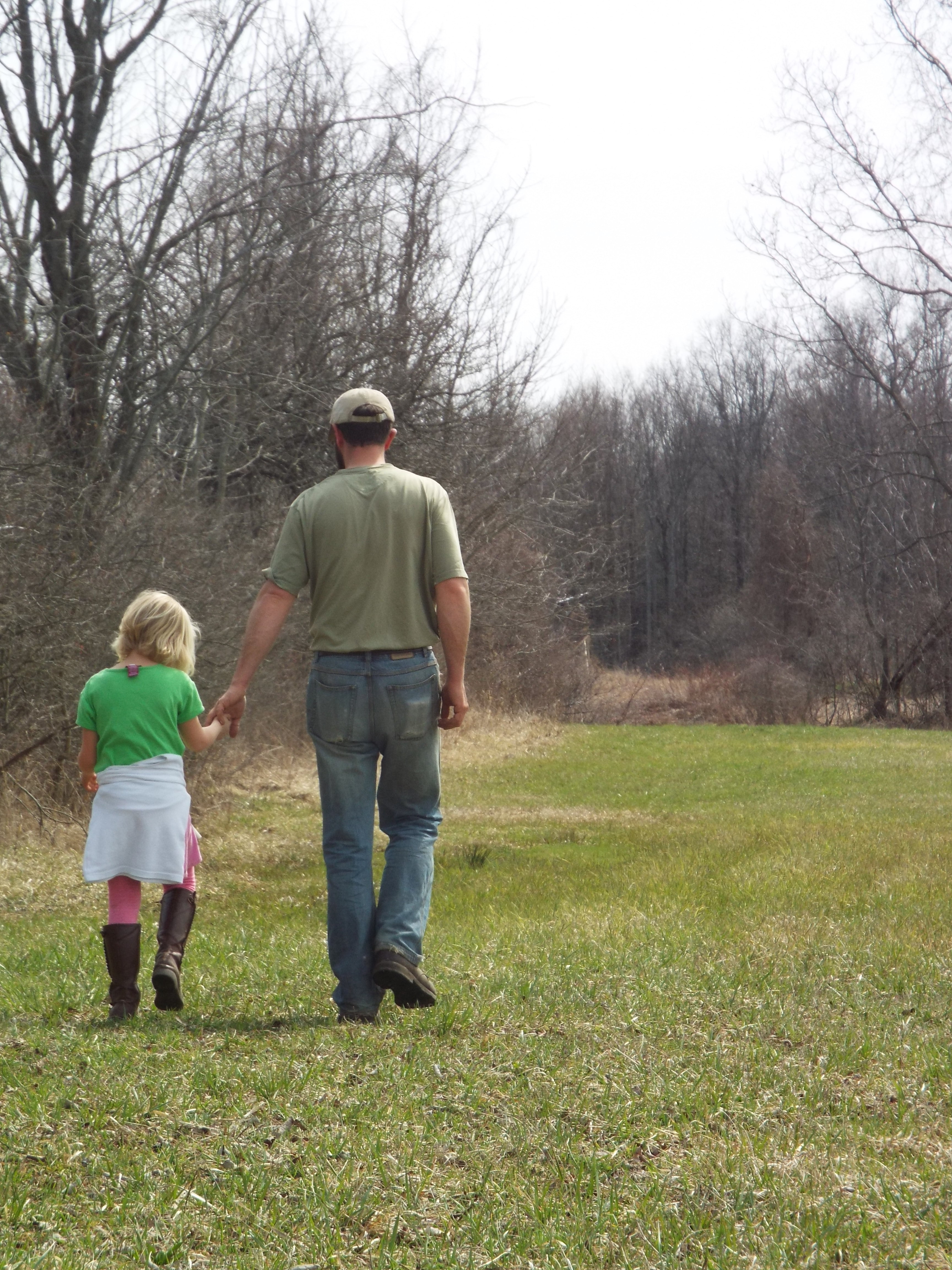 dad and daughter checking out the pastures