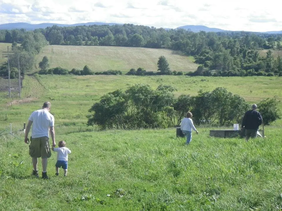 family going out to look at the broilers