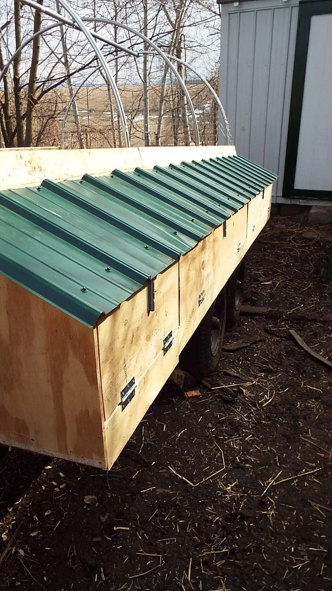 The two five foot sections on the right are the external access to the nest boxes.  The two foot section on the left is a storage cabinet for egg brushes and empty egg cartons.