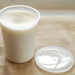 Quart container of rendered leaf lard from pasture raised pigs.